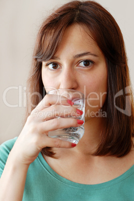 Young woman drinking water