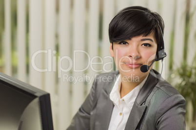 Attractive Young Mixed Race Woman Smiles Wearing Headset