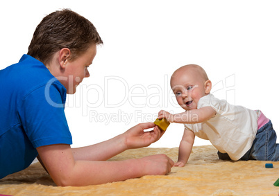 Happy inquisitive baby playing with Dad