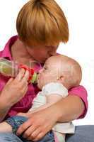 Young Mum bottlefeeding baby