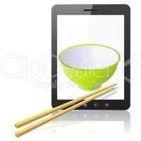 Tablet PC computer with ceramic mug with wooden sticks