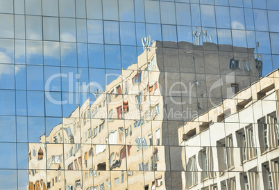 old and new building