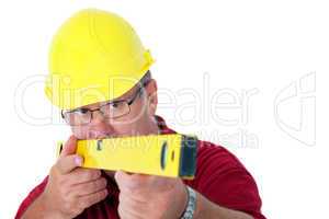 Construction worker with level