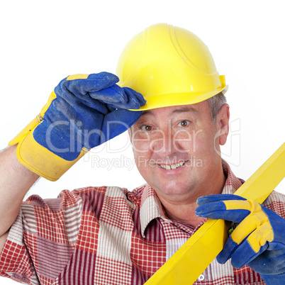 Friendly construction worker with a spirit level and safety gloves