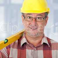 Construction worker with level