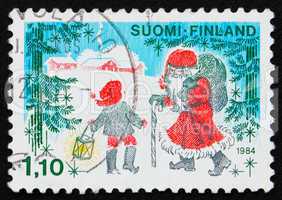 Postage stamp Finland 1984 Father Christmas and a Child