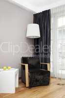 room with lamp and chair