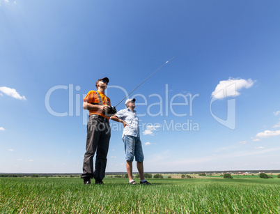 Two Man controls RC gliders