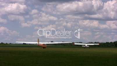 Towplane and Competitor Glider take off and fly in the air