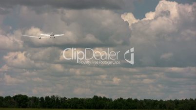 Championship Tow plane tows a Glider in the airspace.