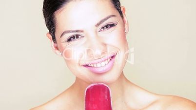 Woman with beautiful smile and ice lolly
