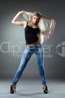 Beautiful woman in jeans show hairs