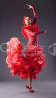 woman flamenco dancer in red costume