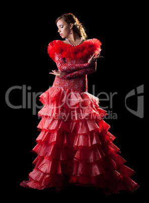 Passion woman flamenco dancer in red costume