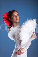 Beauty woman portrait in white flamenco costume