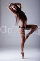 Beauty woman stand in ballet tiptoe topless