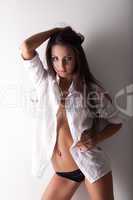 beauty young woman topless posing in shirt