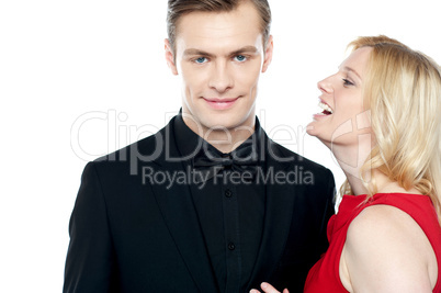 Woman whispering something to her sweetheart
