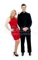 Attractive couple posing in party wear dress