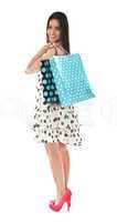 Stunning teenager carrying shopping bags