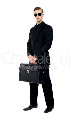 Full length portrait of handsome male with briefcase