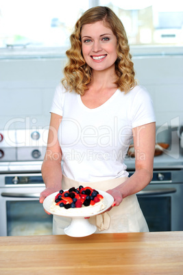 Attractive female presenting yummy treat