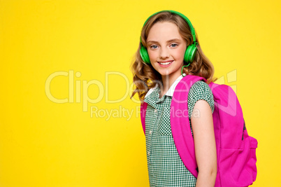 Smiling girl posing with headphones