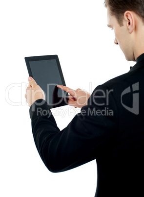 Man operating electronic digital device