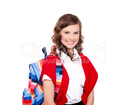 Smiling teenager student with colorful bag