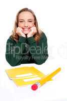 Isolated girl smiling with hands on chin