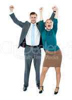 Excited business people celebrating success