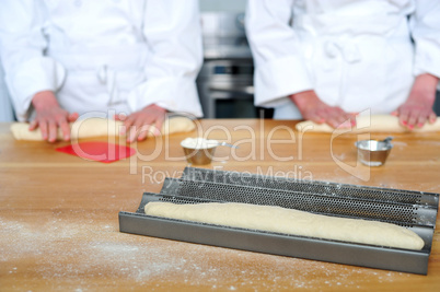 Rolling the dough with hands