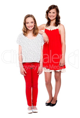 Two young girls posing. Full length shot