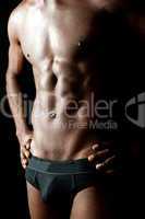 Shirtless underwear male model posing in style