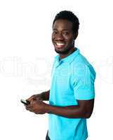 Handsome african man using cellphone