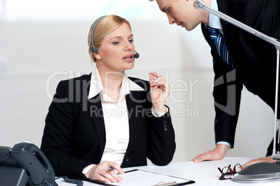 Female executive discussing business issue