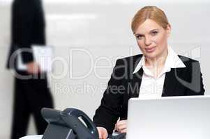 Businesswoman looking at camera