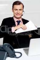 Customer care person arranging office documents