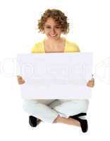 Isolated woman holding blank banner ad