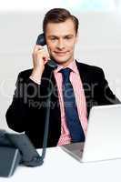 Male executive on a business call