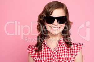 Trendy young girl in black goggles