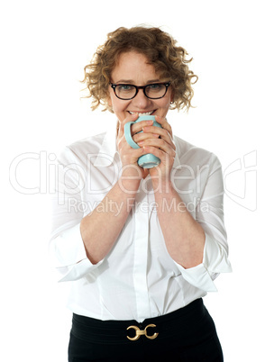 Female executive drinking coffee