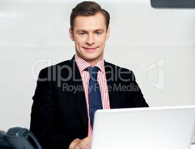 Businessman working on laptop