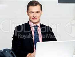 Businessman working on laptop