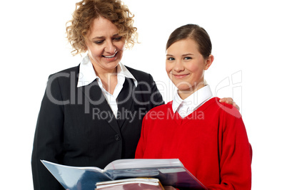 Teacher and student posing together