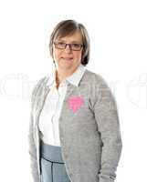 Woman with pink paper heart on her jacket