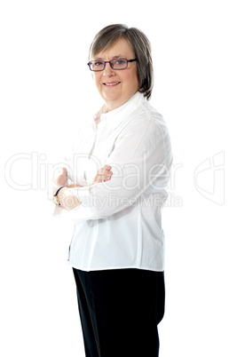 Female employee posing with crossed arms