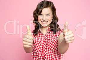 Gorgeous girl showing double thumbs up