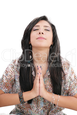 Closeup portrait of a young caucasian woman praying