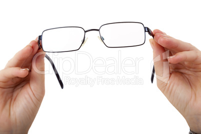 Hand holding glasses